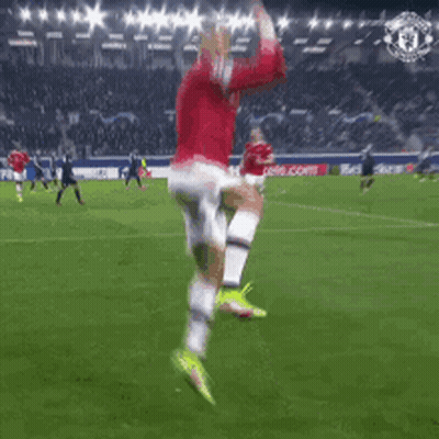 Soccer Player In Red Jersey Number 7 Jumping GIF