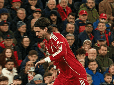 Soccer Player In Red Jersey With White Adidas Logo GIF