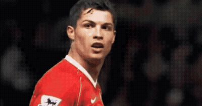 Soccer Player In Red Jersey With White Horse GIF