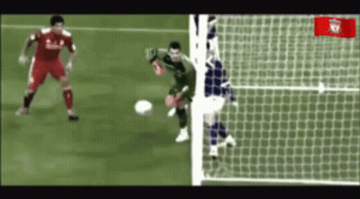 Soccer Player In Red Liverpool Jersey Kicking Ball GIF
