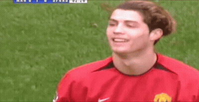 Soccer Player In Red Nike Jersey On Field GIF