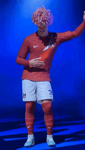 Soccer Player In Red Shirt And White Shorts Number 23 GIF