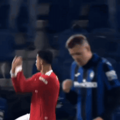 Soccer Player In Red Shirt Dancing, Another Watching GIF