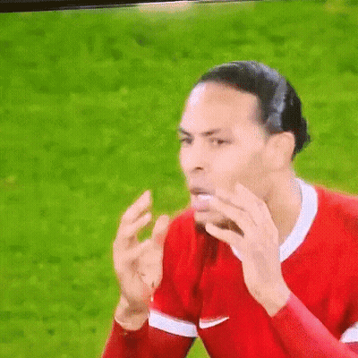 Soccer Player In Red Shirt Funny Face On TV GIF