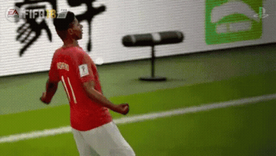 Soccer Player In Red Shirt Number 11 Jumping GIF
