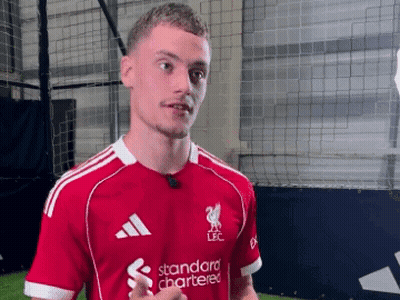 Soccer Player In Red Shirt Saying Standard Chartered GIF