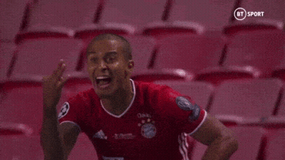 Soccer Player In Red Shirt Screaming In Stadium GIF
