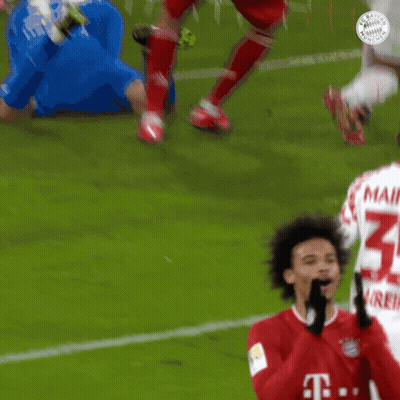 Soccer Player In Red Shirt With Letter T On Field GIF