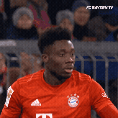 Soccer Player In Red Shirt With Letter T GIF