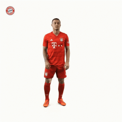 Soccer Player In Red Shirt With Letter T GIF