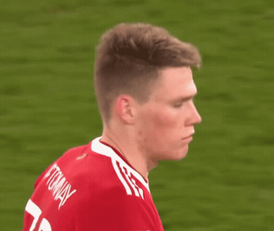 Soccer Player In Red Shirt With White Stripes GIF