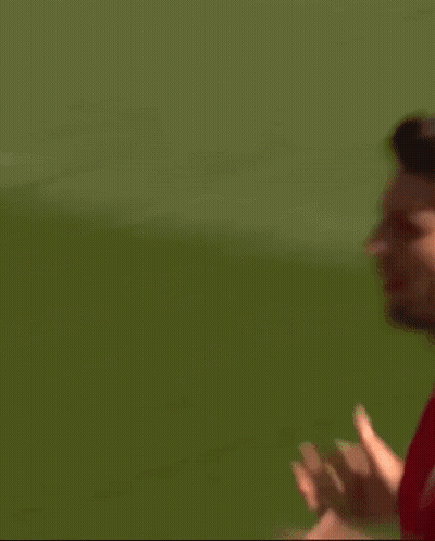 Soccer Player In Red Standard Chartered Jersey GIF