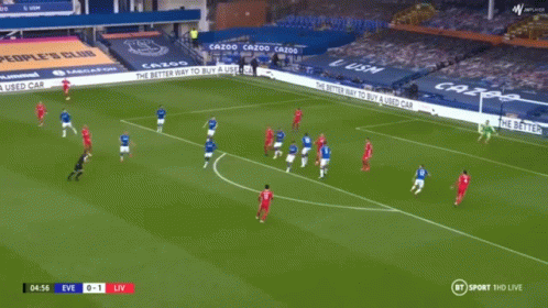 Soccer Player In Red Standard Chartered Shirt Sitting GIF