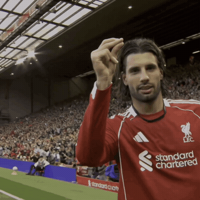 Soccer Player In Red Standard Chartered Shirt GIF