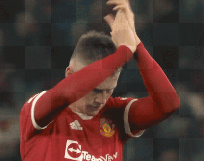 Soccer Player In Red TeamViewer Jersey Applauding GIF