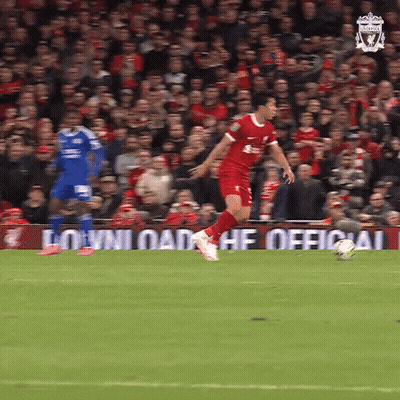Soccer Player In Red Uniform Kicking Ball GIF