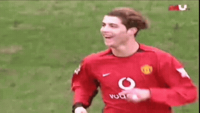 Soccer Player In Red Vodafone Jersey Smiling GIF