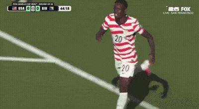 Soccer Player in Red White and Blue Jersey Number 20