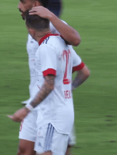 Soccer Player In Saffron Shirt GIF