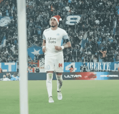 Soccer Player In Santa Hat Running GIF