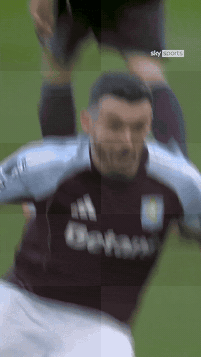 Soccer Player In Sky Sports Shirt Being Tackled GIF