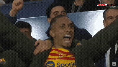 Soccer Player In Spotify Shirt Celebrating With Teammates GIF
