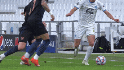 Soccer Player In Uber Eats Jersey Kicking Ball GIF