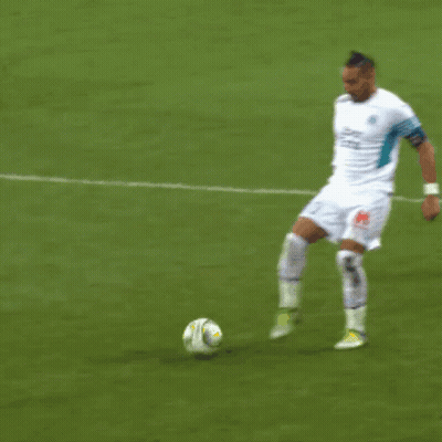 Soccer Player In Uber Eats Jersey Kicking Ball GIF