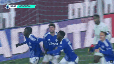 Soccer Player In Uber Jersey Celebrates Goal With Teammates GIF