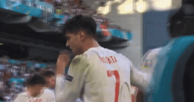 Soccer Player In White #7 Jersey Facing Crowd GIF
