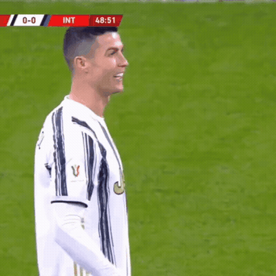 Soccer Player In White And Black Striped Jersey Smiling GIF