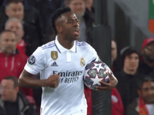Soccer Player In White Emirates Jersey Holding Ball GIF