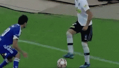 Soccer Player In White Jersey Kicking Ball GIF