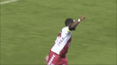 Soccer Player In White Jersey With Arrows Thumbs Up GIF