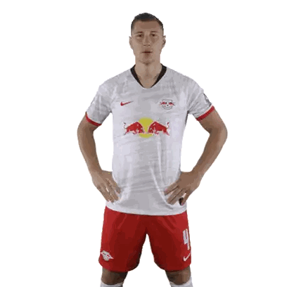 Soccer Player In White Jersey With Red Bulls Sticker