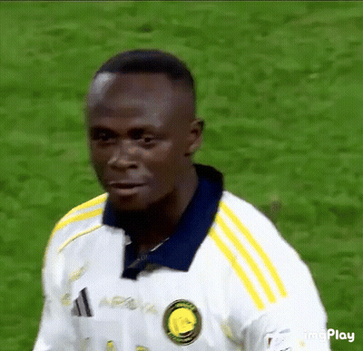 Soccer Player In White Shirt With Yellow Stripes GIF