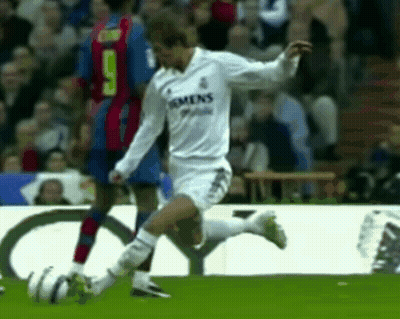 Soccer Player In White Siemens Jersey Kicking Ball GIF