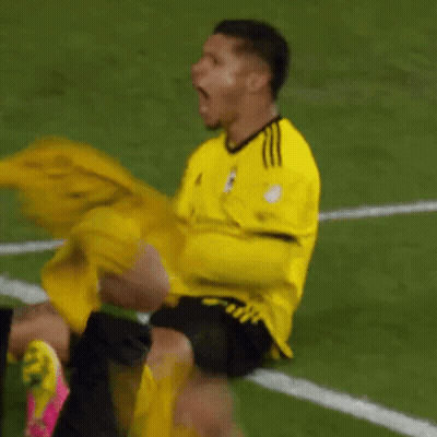 Soccer Player In Yellow Adidas Jersey Screaming GIF