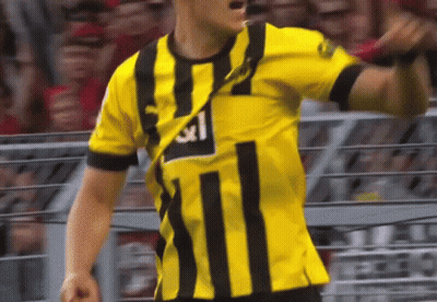 Soccer Player In Yellow And Black Striped Shirt Number 11 GIF