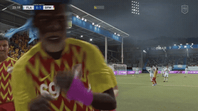 Soccer Player In Yellow And Red Jersey With SG GIF
