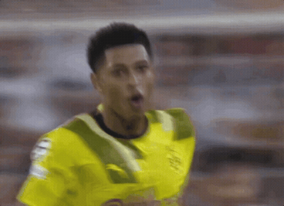 Soccer Player In Yellow Green Jersey Making Face GIF