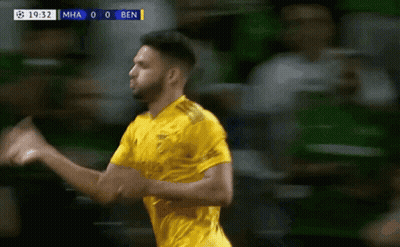 Soccer Player In Yellow Jersey Celebrates Goal Against Ben GIF