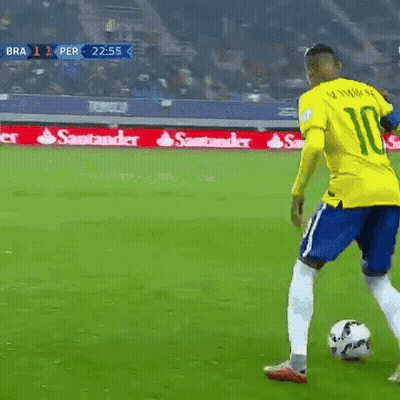 Soccer Player In Yellow Jersey Kicking Ball GIF