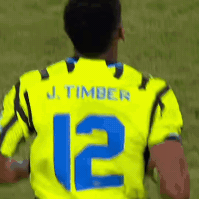 Soccer Player In Yellow Jersey Number 12 Running GIF