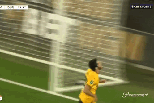 Soccer Player In Yellow Jersey Running Towards Goal On Paramount Plus GIF
