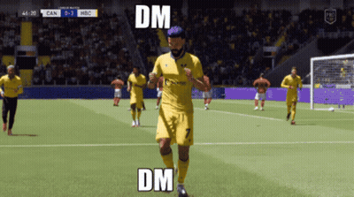 Soccer Player in Yellow Jersey Running With DM