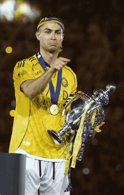 Soccer Player In Yellow Jersey Saying Champions GIF