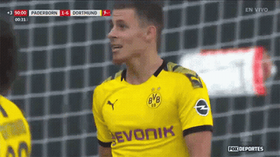 Soccer Player In Yellow Jersey Saying Evonik GIF