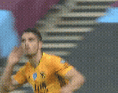 Soccer Player In Yellow Jersey With Blue Eye GIF
