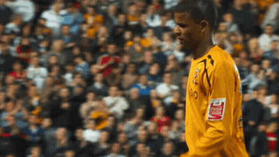 Soccer Player In Yellow Jersey With Coca Cola Logo GIF